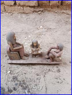 Ancient egyptian antique wooden figurine group depicting daily life social scene