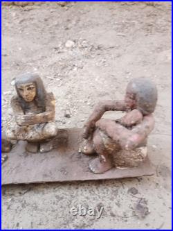Ancient egyptian antique wooden figurine group depicting daily life social scene