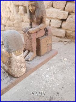 Ancient egyptian antique wooden figurine group depicting daily life social scene