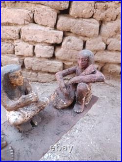 Ancient egyptian antique wooden figurine group depicting daily life social scene
