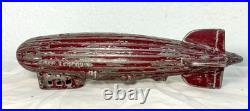 Antique 1920's original AC Williams red Graf Zeppelin cast iron coin still bank