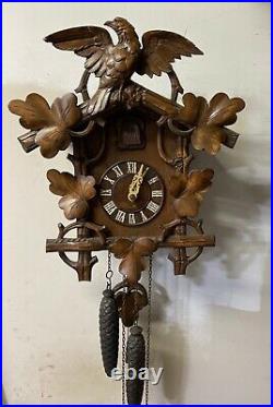 Antique large black forest cuckoo clock