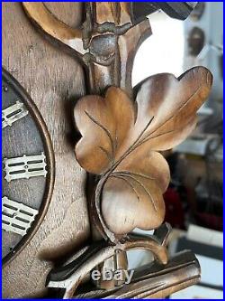 Antique large black forest cuckoo clock