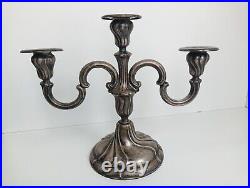 Antique silver candlestick, hollow inside with stamp