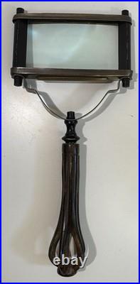 Antique-style wooden and brass handheld magnifying glass