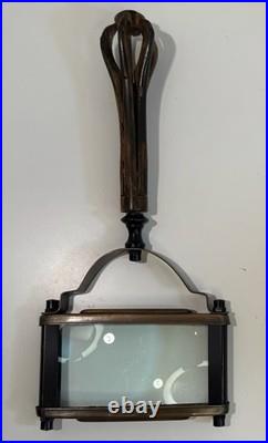 Antique-style wooden and brass handheld magnifying glass