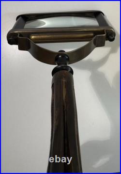 Antique-style wooden and brass handheld magnifying glass