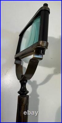 Antique-style wooden and brass handheld magnifying glass