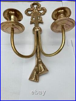 Antique wall candlestick in cast and forged bronze