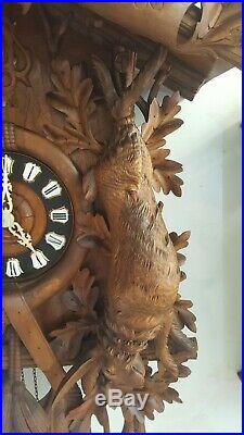 Beautifully carved 5 ft antique cuckoo clock