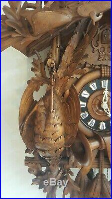 Beautifully carved 5 ft antique cuckoo clock