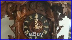 Beautifully carved antique cuckoo clock