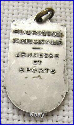 Collection of 16 antique and old silver & silver plated medals, badges & tokens