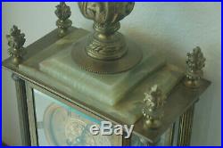 French Antique clock with Marble Base, Glass Doors, and Brass Columns