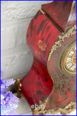 French antique boulle Devil head mantel clock