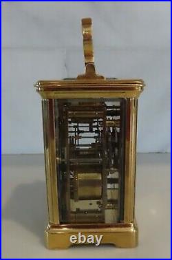 French antique striking gilt carriage clock c1900 of smaller size