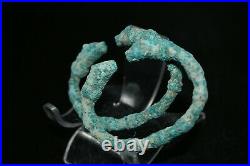 Pair of Antique Bactrian Bronze Bracelets with Protome of Multiple leopards