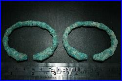 Pair of Antique Bactrian Bronze Bracelets with Protome of Multiple leopards