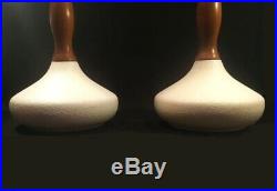 Pair of Mid Century lamps. Ceramic and teak wood. 3-way switch. Handsome Danish